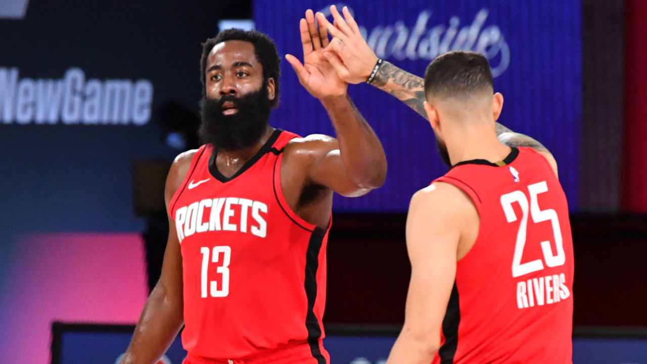 Orlando, FL - AUGUST 2: James Harden #13 of the Houston Rockets high-fives his teammates during a game against the Milwaukee Bucks on August 2, 2020 at The Arena at ESPN Wide World Of Sports Complex in Orlando, Florida. NOTE TO USER: User expressly acknowledges and agrees that, by downloading and/or using this Photograph, user is consenting to the terms and conditions of the Getty Images License Agreement. Mandatory Copyright Notice: Copyright 2020 NBAE