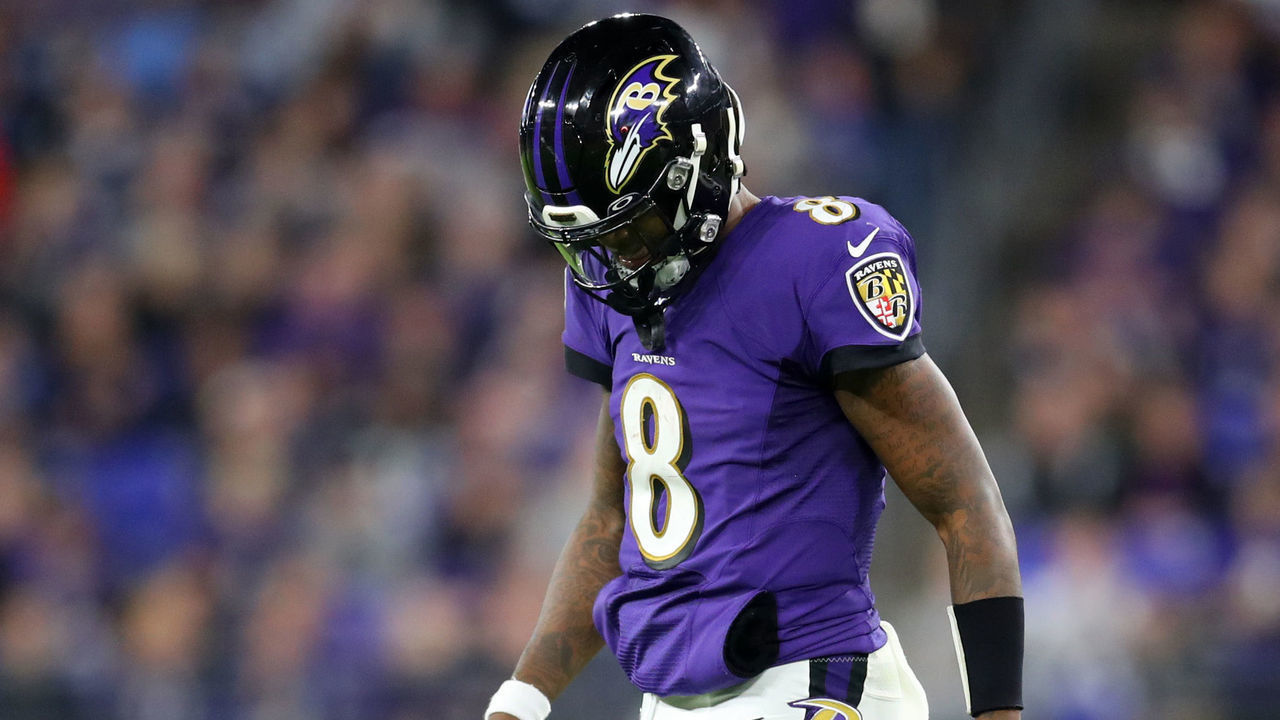 BALTIMORE, MARYLAND - JANUARY 11: Lamar Jackson #8 of the Baltimore Ravens looks on during the AFC Divisional Playoff game against the Tennessee Titans at M&T Bank Stadium on January 11, 2020 in Baltimore, Maryland.