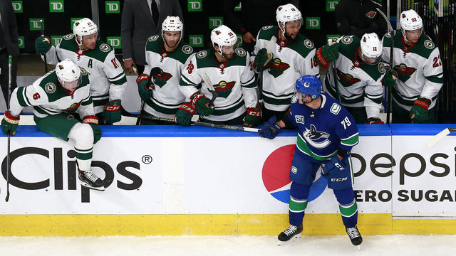 EDMONTON, ALBERTA - AUGUST 02: Micheal Ferland #79 of the Vancouver Canucks is penalized for spearing against the Minnesota Wild team in Game One of the Western Conference Qualification Round prior to the 2020 NHL Stanley Cup Playoffs at Rogers Place on August 02, 2020 in Edmonton, Alberta, Canada.