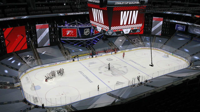 EDMONTON, ALBERTA - AUGUST 01: The Chicago Blackhawks celebrate the 6-4 win over the Edmonton Oilers after Game One of the Western Conference Qualification Round prior to the 2020 NHL Stanley Cup Playoffs at Rogers Place on August 01, 2020 in Edmonton, Alberta. Due to concerns of the spread of the coronavirus, NHL games are being played without fans.