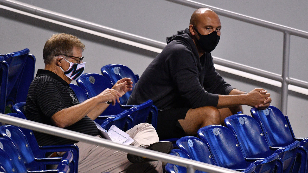 MIAMI, FLORIDA - JULY 17: Chairman Bruce Sherman and CEO Derek Jeter of the Miami Marlins wear masks while attending the intrasquad game at Marlins Park on July 17, 2020 in Miami, Florida.