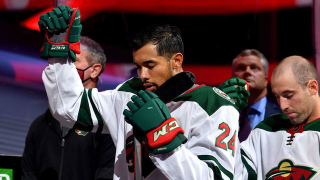 EDMONTON, ALBERTA - AUGUST 02: Matt Dumba #24 of the Minnesota Wild raises his fist during the national anthem of the United States before Game One of the Eastern Conference Qualification Round against the Vancouver Canucks at Rogers Place on August 02, 2020 in Edmonton, Alberta.