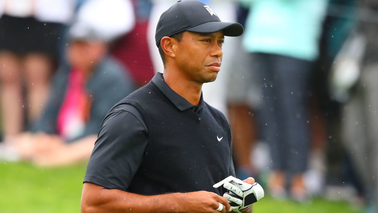 FARMINGDALE, NY - MAY 17: Tiger Woods of the United States walks down the fairway after he tees off at the 1st hole during the second round of the 2019 PGA Championship at the Bethpage Black course on May 17, 2019 in Farmingdale, New York.