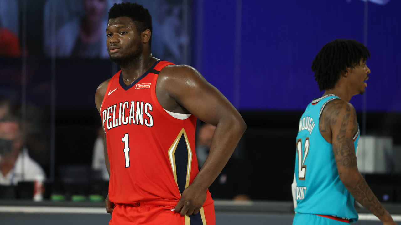 Orlando, FL - AUGUST 3: Zion Williamson #1 of the New Orleans Pelicans and Ja Morant #12 of the Memphis Grizzlies look on during the game on August 3, 2020 at HP Field House at ESPN Wide World of Sports in Orlando, Florida. NOTE TO USER: User expressly acknowledges and agrees that, by downloading and/or using this Photograph, user is consenting to the terms and conditions of the Getty Images License Agreement. Mandatory Copyright Notice: Copyright 2020 NBAE