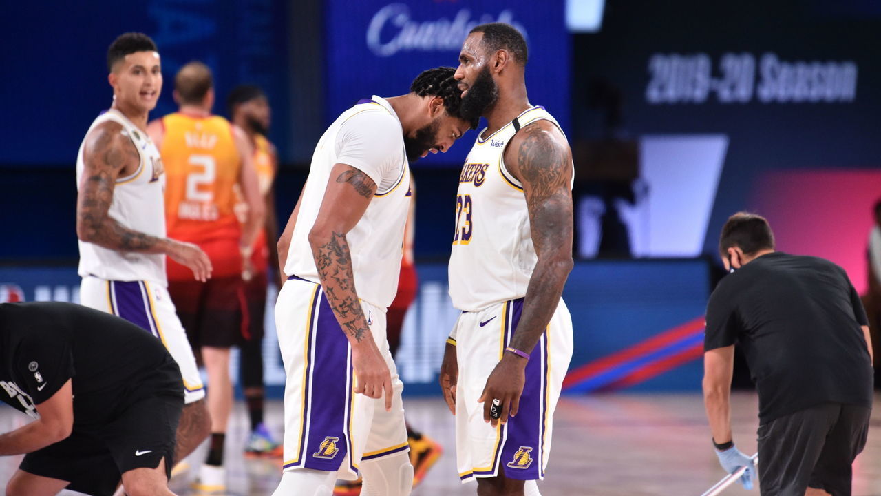 Orlando, FL - AUGUST 3: Anthony Davis #3 of the Los Angeles Lakers and LeBron James #23 of the Los Angeles Lakers talk during a game on August 3, 2020 at The Arena at ESPN Wide World Of Sports Complex in Orlando, Florida. NOTE TO USER: User expressly acknowledges and agrees that, by downloading and/or using this Photograph, user is consenting to the terms and conditions of the Getty Images License Agreement. Mandatory Copyright Notice: Copyright 2020 NBAE