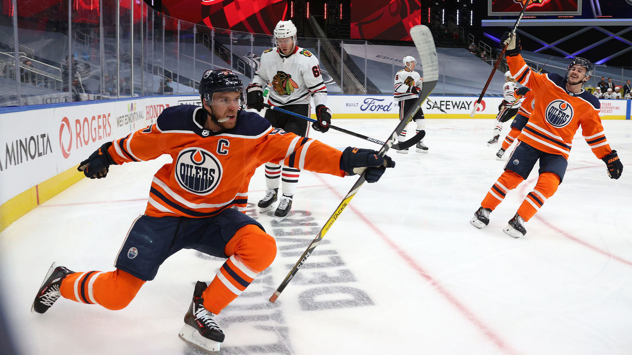 EDMONTON, ALBERTA - AUGUST 03: Connor McDavid #97 of the Edmonton Oilers celebrates his second goal of the first period of Game Two of the Western Conference Qualification Round against the Chicago Blackhawks prior to the 2020 NHL Stanley Cup Playoffs at Rogers Place on August 03, 2020 in Edmonton, Alberta.