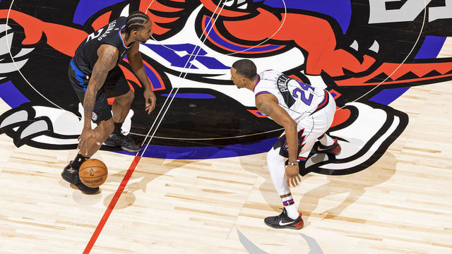TORONTO, CANADA - DECEMBER 11: Kawhi Leonard #2 of the LA Clippers handles the ball during the game while Norman Powell #24 of the Toronto Raptors plays defense during the game on December 11, 2019 at the Scotiabank Arena in Toronto, Ontario, Canada. Mandatory Copyright Notice: Copyright 2019 NBAE