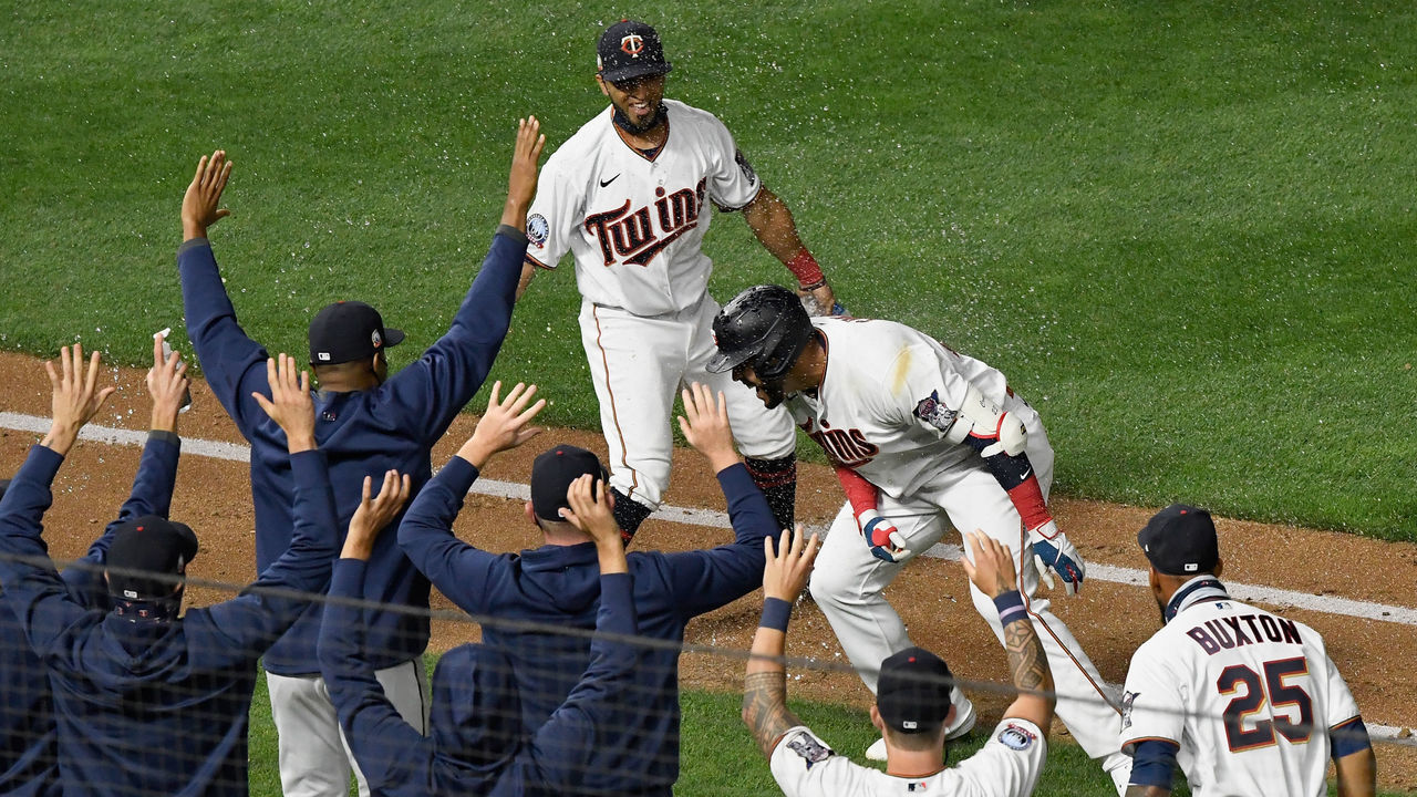 MINNEAPOLIS, MINNESOTA - AUGUST 03: The Minnesota Twins congratulate Nelson Cruz #23 on a walk-off double against the Pittsburgh Pirates during the ninth inning of the game at Target Field on August 3, 2020 in Minneapolis, Minnesota. The Twins defeated the Pirates 5-4.
