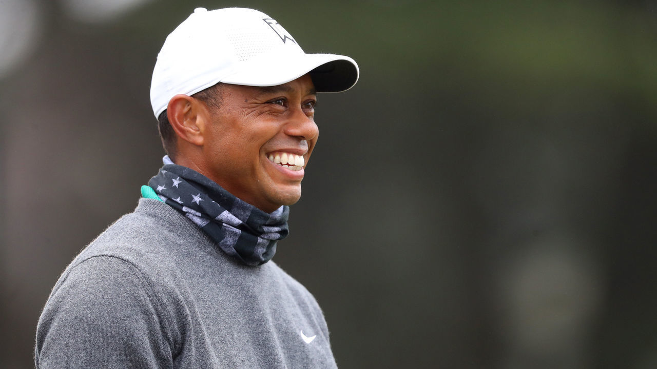 SAN FRANCISCO, CALIFORNIA - AUGUST 04: Tiger Woods of the United States laughs during a practice round prior to the 2020 PGA Championship at TPC Harding Park on August 04, 2020 in San Francisco, California.