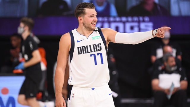 Orlando, FL - AUGUST 4: Luka Doncic #77 of the Dallas Mavericks reacts during the game against the Sacramento Kings on August 4, 2020 at The Arena at ESPN Wide World of Sports in Orlando, Florida. NOTE TO USER: User expressly acknowledges and agrees that, by downloading and/or using this Photograph, user is consenting to the terms and conditions of the Getty Images License Agreement. Mandatory Copyright Notice: Copyright 2020 NBAE