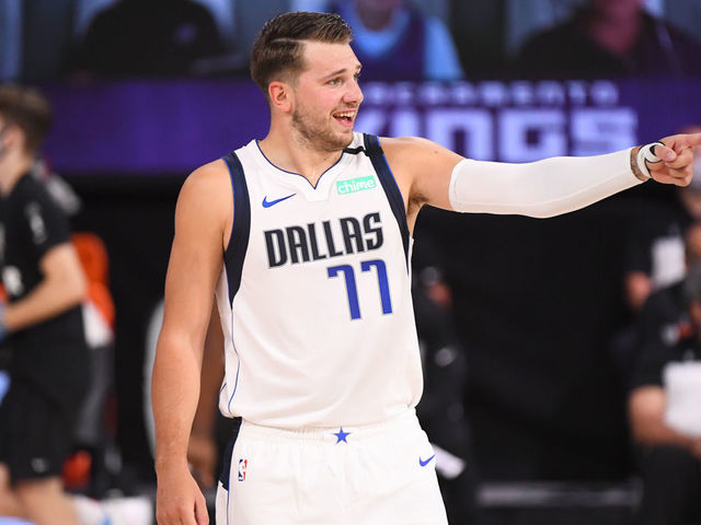 Orlando, FL - AUGUST 4: Luka Doncic #77 of the Dallas Mavericks reacts during the game against the Sacramento Kings on August 4, 2020 at The Arena at ESPN Wide World of Sports in Orlando, Florida. NOTE TO USER: User expressly acknowledges and agrees that, by downloading and/or using this Photograph, user is consenting to the terms and conditions of the Getty Images License Agreement. Mandatory Copyright Notice: Copyright 2020 NBAE