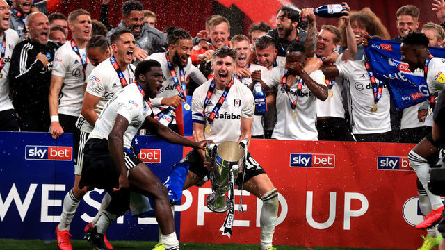 Fulhams captain Tom Cairney lifts the trophy after they win the Sky Bet Championship Play Off Final at Wembley Stadium, London.
