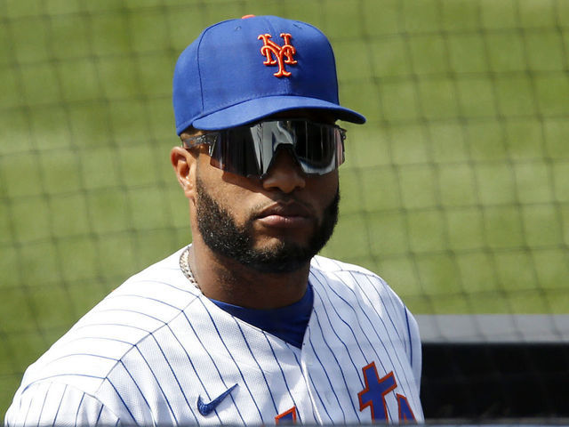 NEW YORK, NEW YORK - JULY 25: Robinson Cano #24 of the New York Mets looks on against the Atlanta Braves at Citi Field on July 25, 2020 in New York City. The 2020 season had been postponed since March due to the COVID-19 pandemic. The Braves defeated the Mets 5-3 in ten innings.