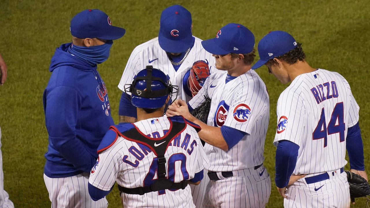 CHICAGO, ILLINOIS - AUGUST 04: Craig Kimbrel #46 of the Chicago Cubs is removed by manager David Ross #3 during the ninth inning of a game against the Kansas City Royals at Wrigley Field on August 04, 2020 in Chicago, Illinois.