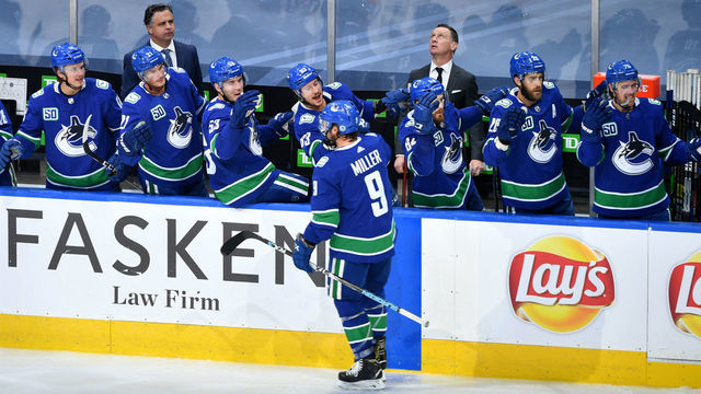 EDMONTON, ALBERTA - AUGUST 04: J.T. Miller #9 of the Vancouver Canucks celebrate his goal against the Minnesota Wild during the second period of Game Two of the Western Conference Qualification Round at Rogers Place on August 04, 2020 in Edmonton, Alberta.