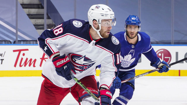 TORONTO, ONTARIO - AUGUST 04: Pierre-Luc Dubois #18 of the Columbus Blue Jackets plays the puck against the Toronto Maple Leafs duirng the second period in Game Two of the Eastern Conference Qualification Round at Scotiabank Arena on August 04, 2020 in Toronto, Ontario.