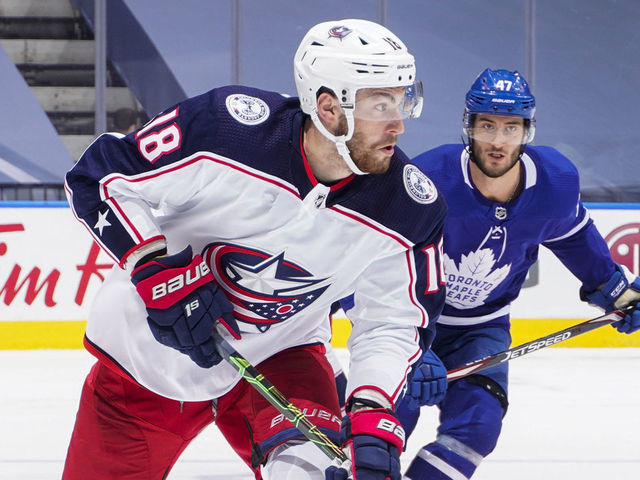 TORONTO, ONTARIO - AUGUST 04: Pierre-Luc Dubois #18 of the Columbus Blue Jackets plays the puck against the Toronto Maple Leafs duirng the second period in Game Two of the Eastern Conference Qualification Round at Scotiabank Arena on August 04, 2020 in Toronto, Ontario.