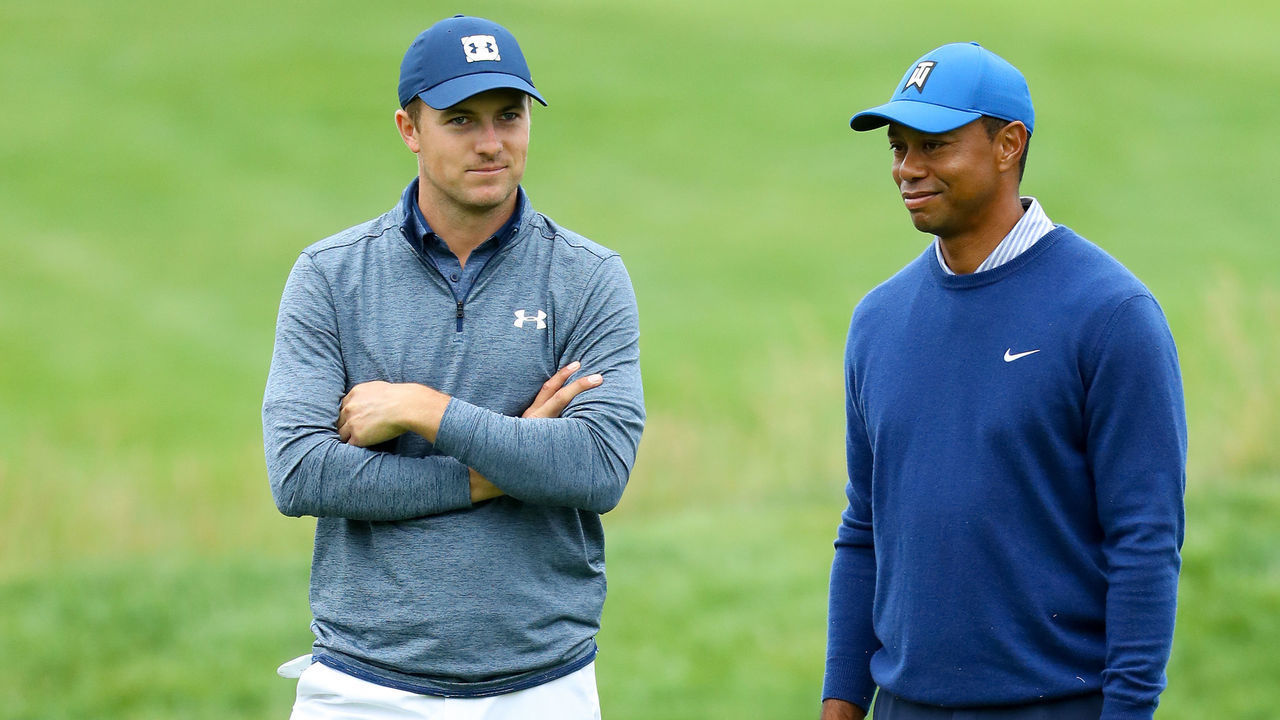 PEBBLE BEACH, CALIFORNIA - JUNE 14: Jordan Spieth of the United States (L) and Tiger Woods of the United States talk on the 11th green during the second round of the 2019 U.S. Open at Pebble Beach Golf Links on June 14, 2019 in Pebble Beach, California.