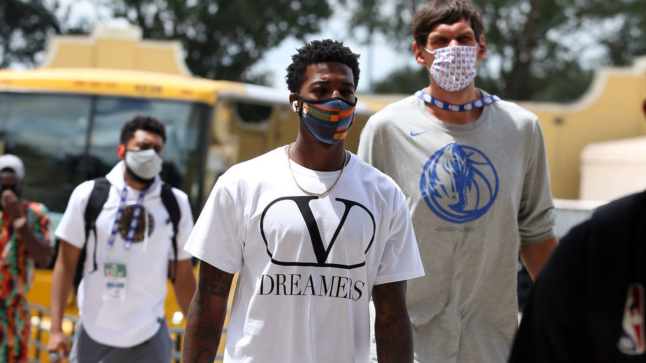 Orlando, FL - AUGUST 4: Delon Wright #55 of the Dallas Mavericks arrives to the arena before the game against the Sacramento Kings on August 4, 2020 at The HP Field House at ESPN Wide World Of Sports Complex in Orlando, Florida. NOTE TO USER: User expressly acknowledges and agrees that, by downloading and/or using this Photograph, user is consenting to the terms and conditions of the Getty Images License Agreement. Mandatory Copyright Notice: Copyright 2020 NBAE