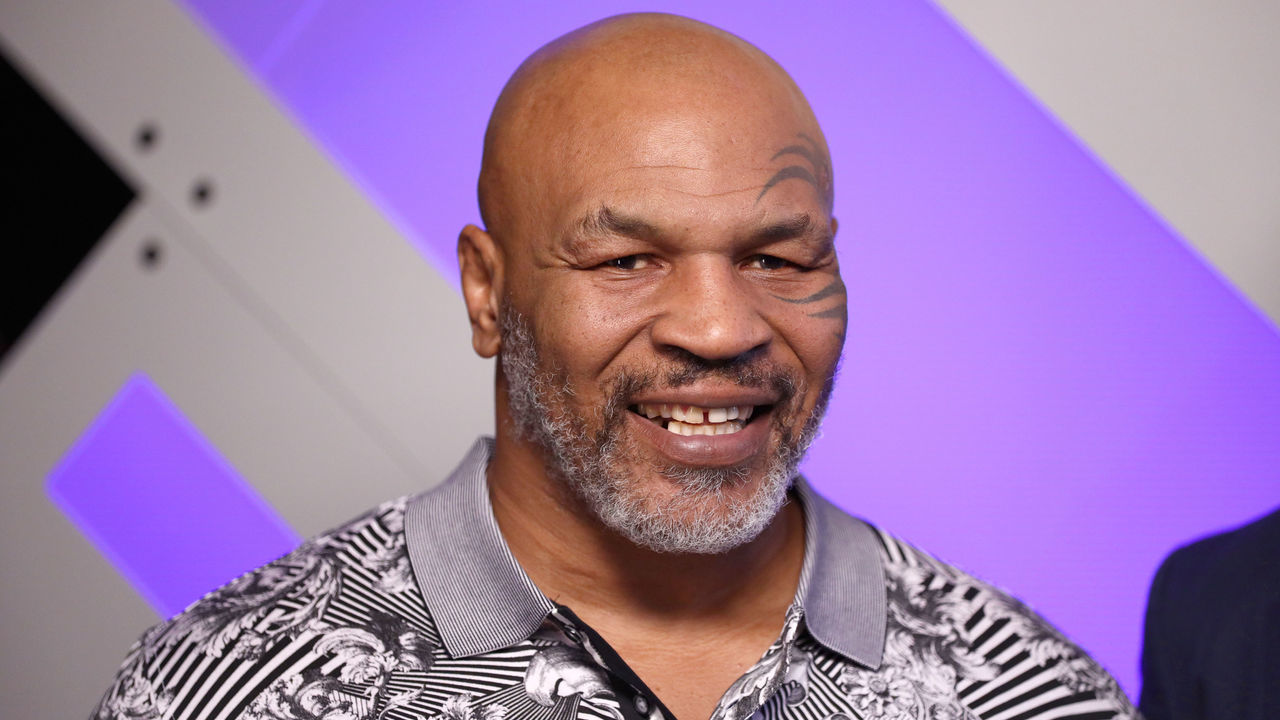BURBANK, CALIFORNIA - JANUARY 18: (EDITORIAL USE ONLY. NO COMMERCIAL USE) Mike Tyson speaks with Mario Lopez at Capital One Podcast Studio during the 2019 iHeartRadio Podcast Awards Presented by Capital One at the iHeartRadio Theater LA on January 18, 2019 in Burbank, California.