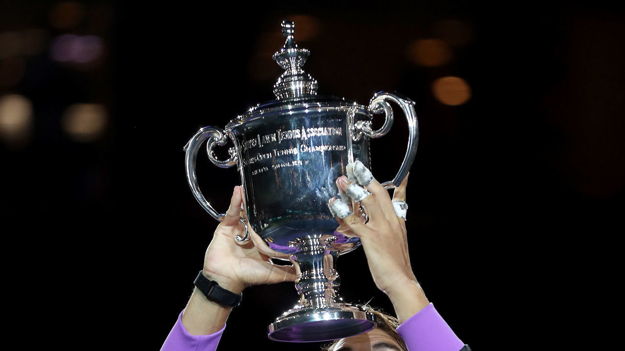 NEW YORK, NEW YORK - SEPTEMBER 08: Rafael Nadal of Spain celebrates with the championship trophy during the trophy presentation ceremony after winning his Men's Singles final match against Daniil Medvedev of Russia on day fourteen of the 2019 US Open at the USTA Billie Jean King National Tennis Center on September 08, 2019 in the Queens borough of New York City.