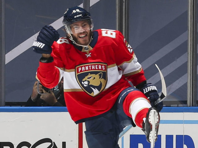 TORONTO, ONTARIO - AUGUST 05: Mike Hoffman #68 of the Florida Panthers celebrates his goal against the New York Islanders during the third period in Game Three of the Eastern Conference Qualification Round at Scotiabank Arena on August 05, 2020 in Toronto, Ontario.