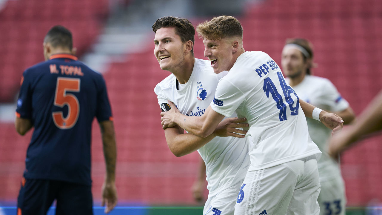 COPENHAGEN, DENMARK - AUGUST 05: Jonas Wind and Pep Biel of FC Copenhagen celebrate after scoring their first goal during the UEFA Europa League round of 16, second leg match between FC Copenhagen and Istanbul Basaksehir at Telia Parken on August 5, 2020 in Copenhagen, Denmark.