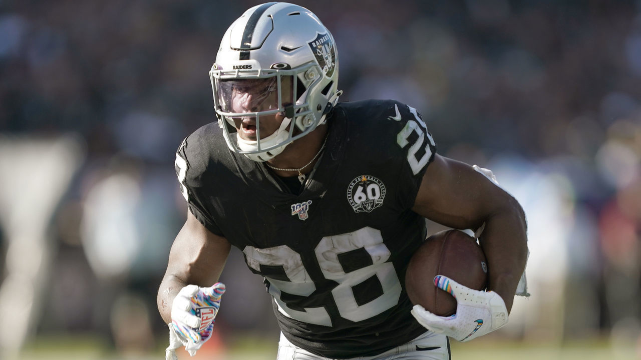 OAKLAND, CALIFORNIA - NOVEMBER 03: Josh Jacobs #28 of the Oakland Raiders scores on a two yard touchdown run against the Detroit Lions during the second quarter of an NFL football game at RingCentral Coliseum on November 03, 2019 in Oakland, California.