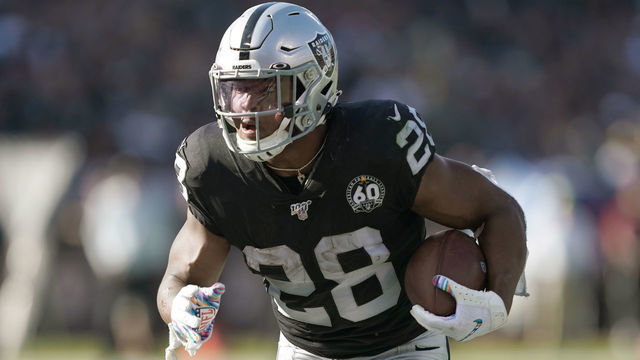 OAKLAND, CALIFORNIA - NOVEMBER 03: Josh Jacobs #28 of the Oakland Raiders scores on a two yard touchdown run against the Detroit Lions during the second quarter of an NFL football game at RingCentral Coliseum on November 03, 2019 in Oakland, California.