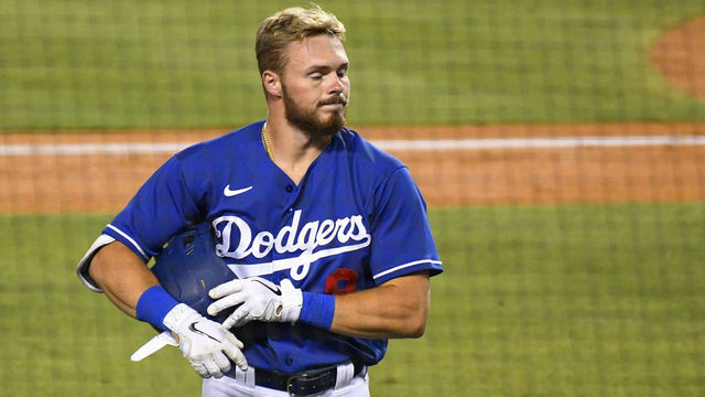 LOS ANGELES, CA - JULY 20: Los Angeles Dodgers infielder Gavin Lux (9) looks on after grounding out during a MLB exhibition game between the Arizona Diamondbacks and the Los Angeles Dodgers on July 20, 2020 at Dodger Stadium in Los Angeles, CA.