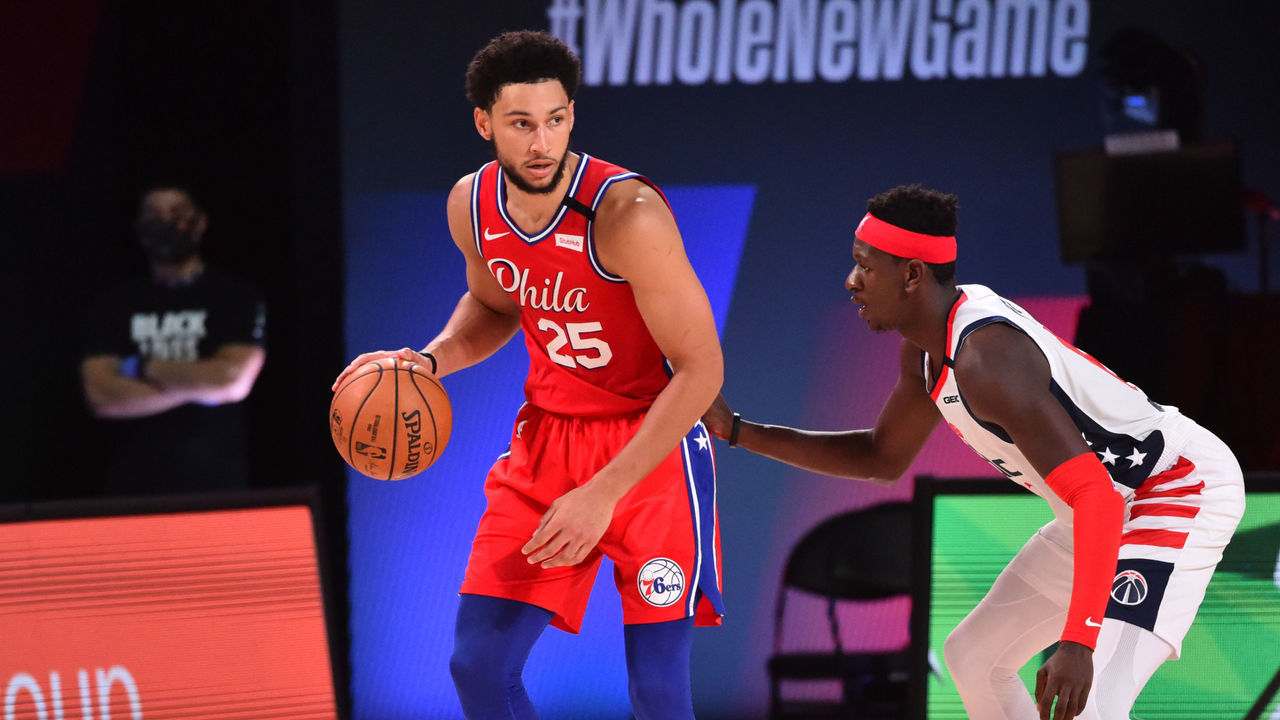 Orlando, FL - AUGUST 5: Ben Simmons #25 of the Philadelphia 76ers handles the ball against the Washington Wizards on August 5, 2020 at The Arena at ESPN Wide World of Sports in Orlando, Florida. NOTE TO USER: User expressly acknowledges and agrees that, by downloading and/or using this Photograph, user is consenting to the terms and conditions of the Getty Images License Agreement. Mandatory Copyright Notice: Copyright 2020 NBAE