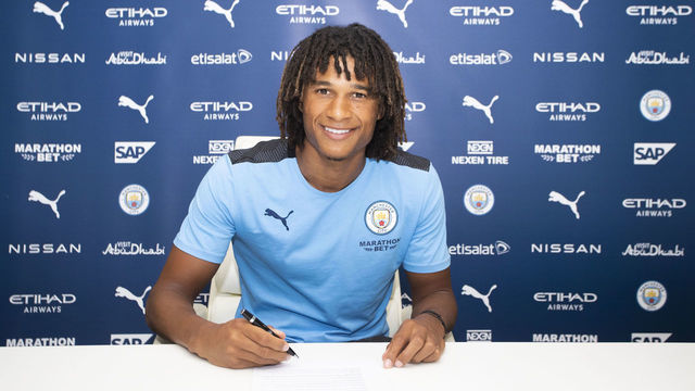 MANCHESTER, ENGLAND - AUGUST 05: Nathan Ake Signs a contract as he is unveiled as a new signing for Manchester City at Etihad Stadium on August 05, 2020 in Manchester, England.