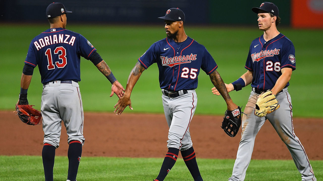 PITTSBURGH, PA - AUGUST 05: Ehire Adrianza #13 and Byron Buxton #25 of the Minnesota Twins celebrate after a 5-2 win over the Pittsburgh Pirates at PNC Park on August 5, 2020 in Pittsburgh, Pennsylvania.