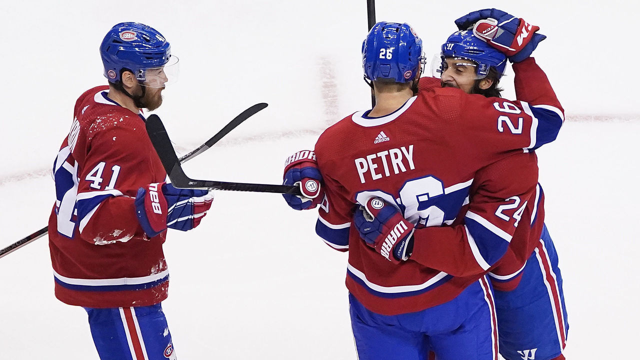 TORONTO, ONTARIO - AUGUST 05: Jeff Petry #26 of the Montreal Canadiens celebrates his third period goal at 5:33 with Brendan Gallagher #11 against the Pittsburgh Penguins in Game Three of the Eastern Conference Qualification Round prior to the 2020 NHL Stanley Cup Playoffs at Scotiabank Arena on August 05, 2020 in Toronto, Ontario.