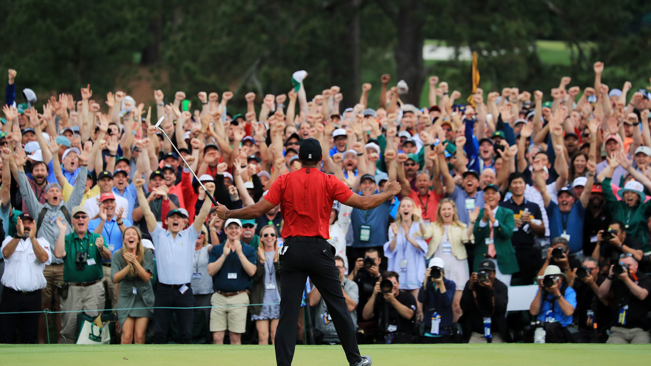 AUGUSTA, GEORGIA - APRIL 14: Tiger Woods of the United States celebrates after sinking his putt on the 18th green to win during the final round of the Masters at Augusta National Golf Club on April 14, 2019 in Augusta, Georgia.