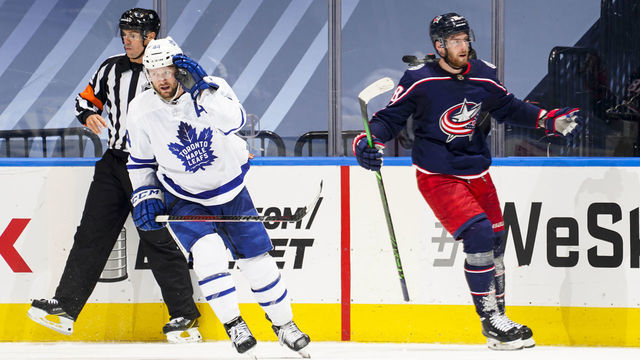 TORONTO, ONTARIO - AUGUST 06: Pierre-Luc Dubois #18 of the Columbus Blue Jackets celebrates after scoring his third goal of the night and the game winning goal in overtime against the Toronto Maple Leafs in Game Three of the Eastern Conference Qualification Round at Scotiabank Arena on August 06, 2020 in Toronto, Ontario.