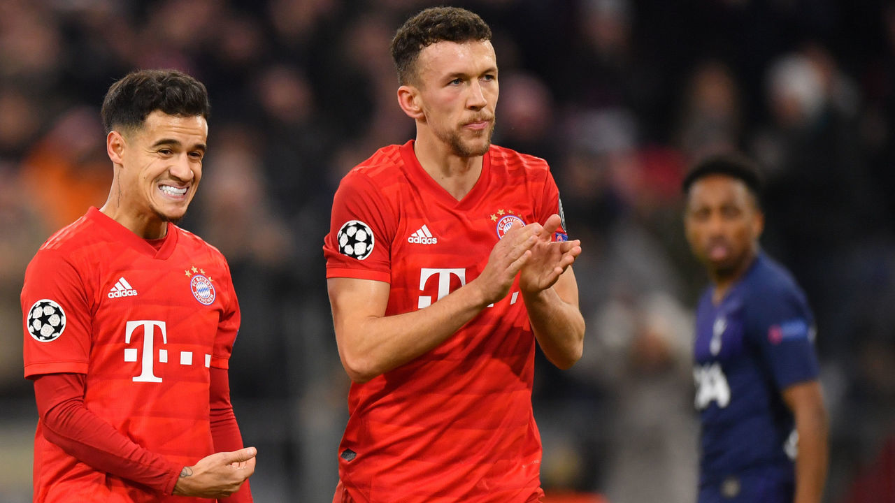 MUNICH, GERMANY - DECEMBER 11: Philippe Coutinho and Ivan Perisic of Bayern Muenchen celebrate after their team's second goal during the UEFA Champions League group B match between Bayern Muenchen and Tottenham Hotspur at Allianz Arena on December 11, 2019 in Munich, Germany.