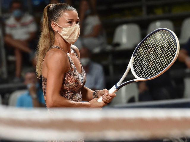 PALERMO, ITALY - AUGUST 06: Camila Giorgi of Italy wears a face mask before her match against Kaja Juvan of Slovenia during the 31st Palermo Ladies Open - Day Four on August 06, 2020 in Palermo, Italy.