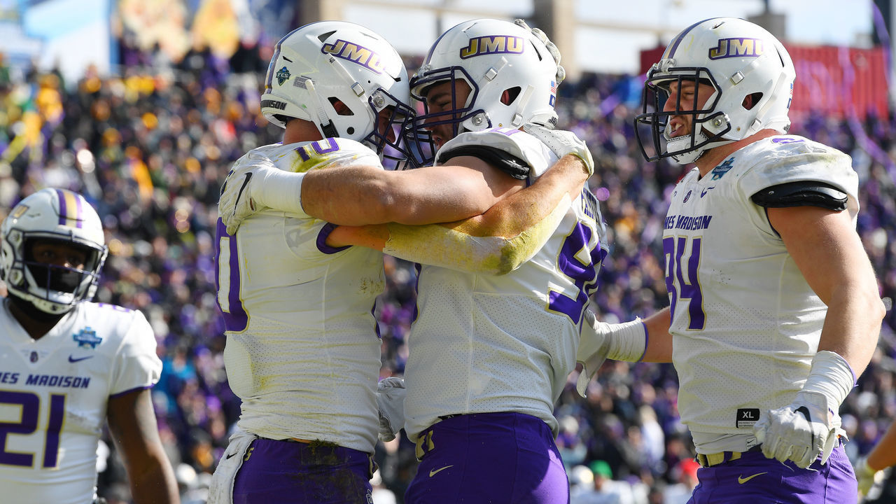 FRISCO, TX - JANUARY 11: Drew Painter #90 of the James Madison Dukes congratulates Riley Stapleton on a touchdown against the North Dakota State Bison during the Division I FCS Football Championship held at Toyota Stadium on January 11, 2020 in Frisco, Texas.