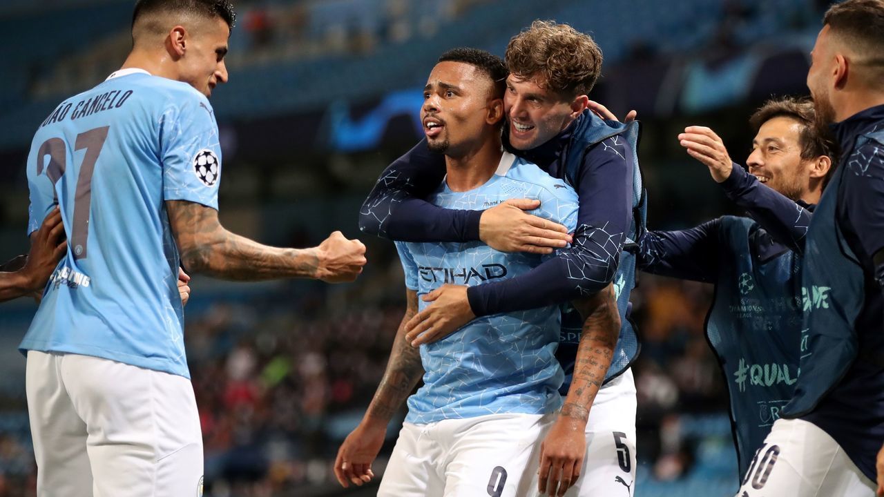 Manchester City's Brazilian striker Gabriel Jesus (C) celebrates scoring his team's second goal during the UEFA Champions League round of 16 second leg football match between Manchester City and Real Madrid at the Etihad Stadium in Manchester, north west England on August 7, 2020.