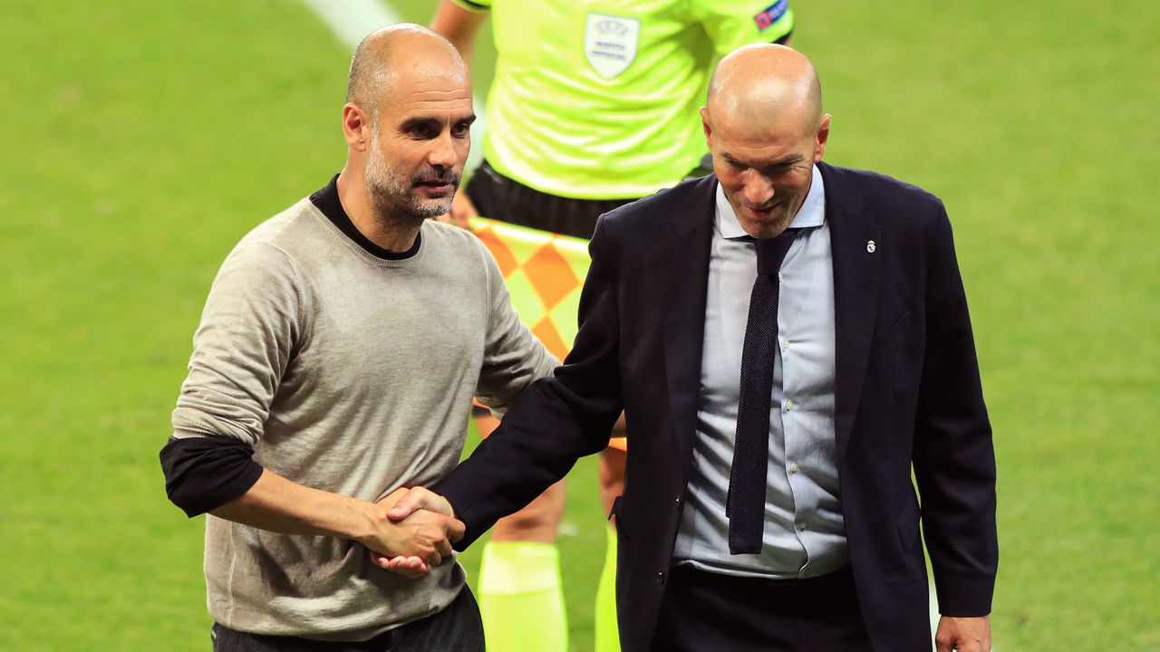MANCHESTER, ENGLAND - AUGUST 07: Pep Guardiola, Manager of Manchester City shakes hands with Zinedine Zidane, Head Coach of Real Madrid following the UEFA Champions League round of 16 second leg match between Manchester City and Real Madrid at Etihad Stadium on August 07, 2020 in Manchester, England.