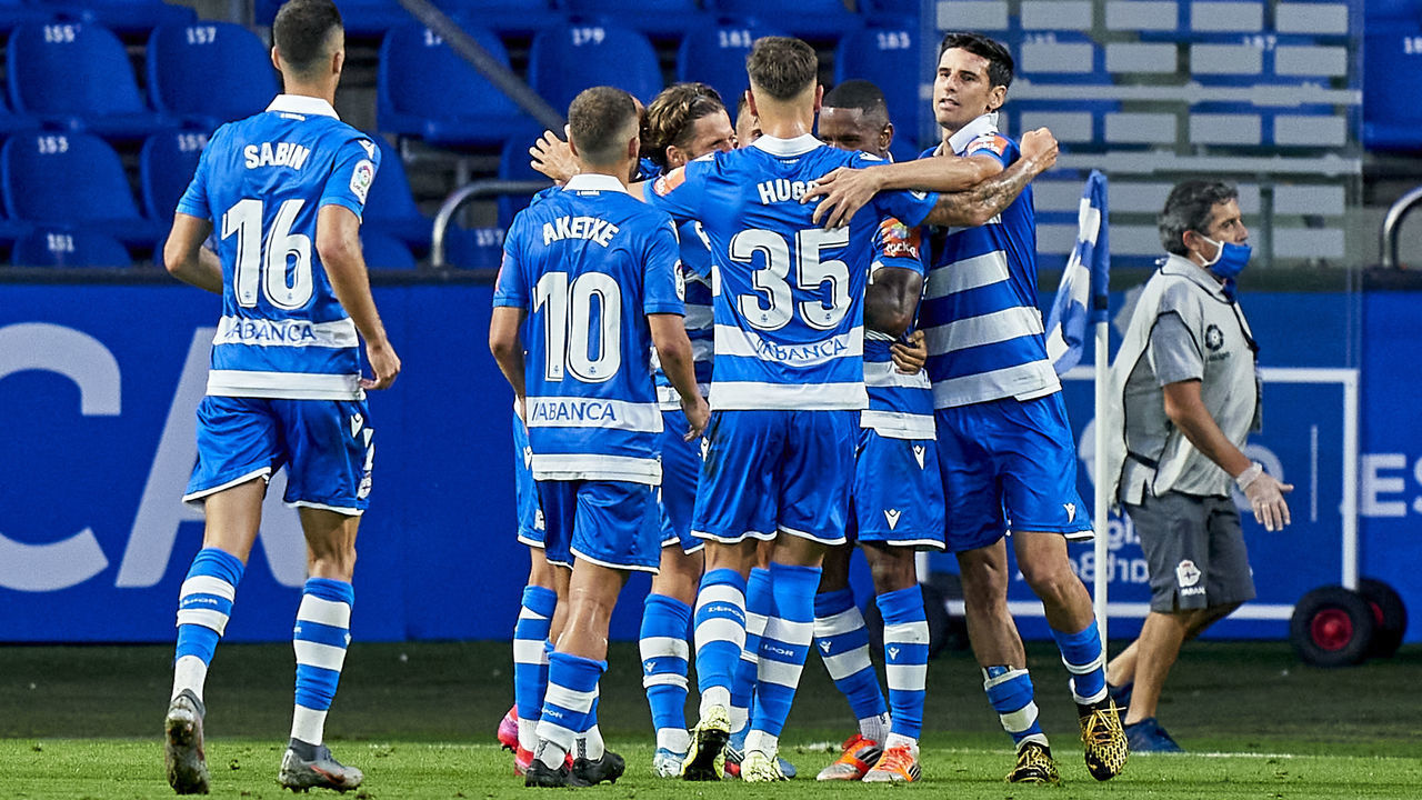 LA CORUNA, SPAIN - AUGUST 07: Claudio Beauvue of Deportivo de La Coruna celebrates with his team mates after scoring his team's second goal during the La Liga Smartbank match between RC Deportivo and CF Fuenlabrada at Estadio Abanca Riazor on August 07, 2020 in La Coruna, Spain.
