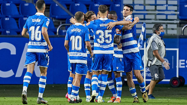 LA CORUNA, SPAIN - AUGUST 07: Claudio Beauvue of Deportivo de La Coruna celebrates with his team mates after scoring his team's second goal during the La Liga Smartbank match between RC Deportivo and CF Fuenlabrada at Estadio Abanca Riazor on August 07, 2020 in La Coruna, Spain.