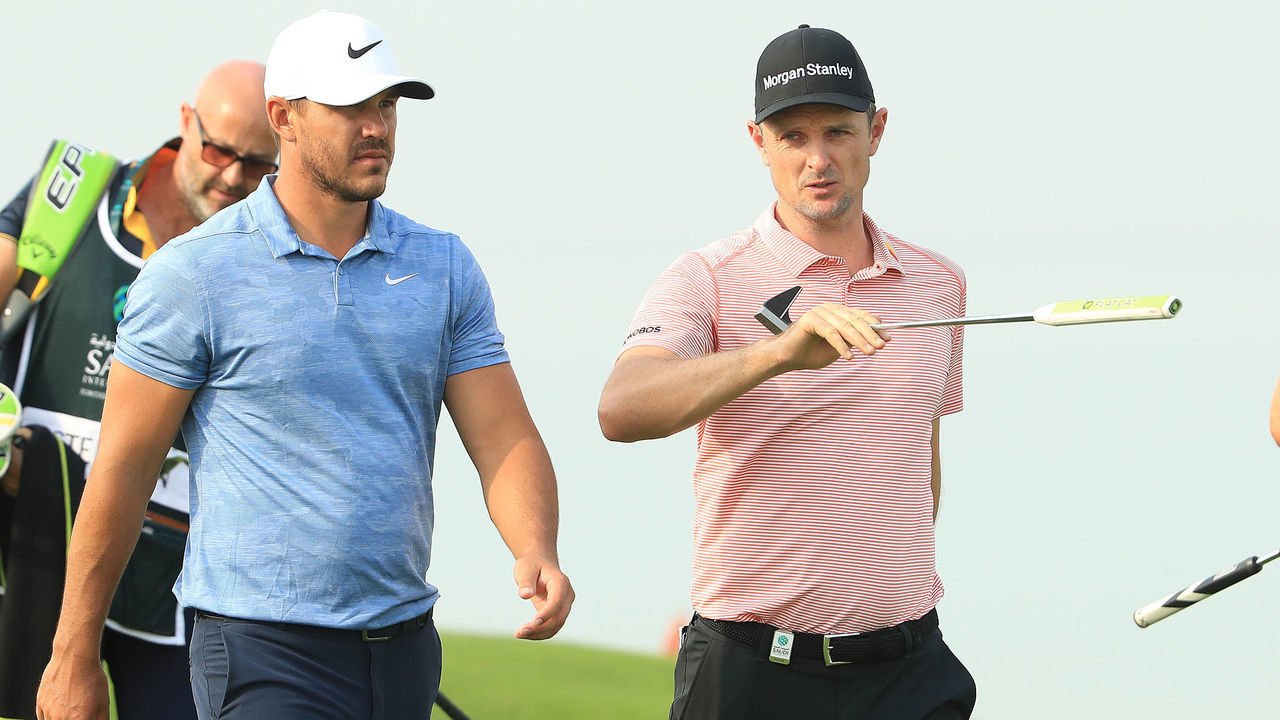 UNSPECIFIED, SAUDI ARABIA - JANUARY 31: (L-R) Brooks Koepka of the United States, Justin Rose of England and Henrik Stenson of Sweden walk together on the 16th hole on Day One of the Saudi International at Royal Greens Golf and Country Club on January 31, 2019 in King Abdullah Economic City, Saudi Arabia.