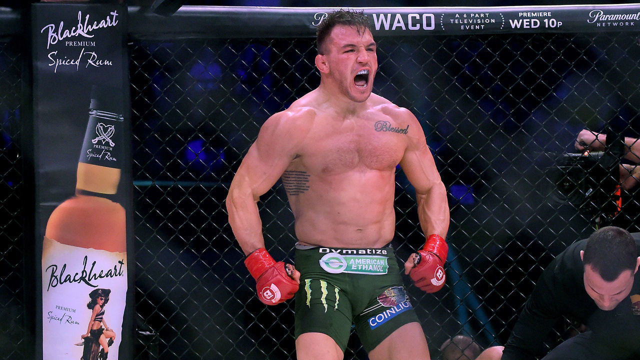 INGLEWOOD, CA - JANUARY 20: Michael Chandler Jr (red gloves) celebrates after defeating Goiti Yamauchi (not pictured) in their Lightweight fight at Bellator 192 at The Forum on January 20, 2018 in Inglewood, California. Michael Chandler Jr won by unanimous decision.