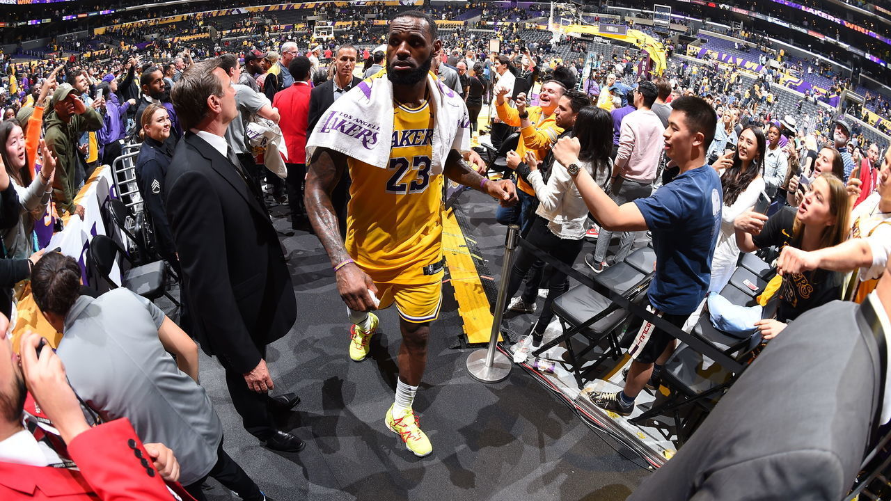 LOS ANGELES, CA - MARCH 3: LeBron James #23 of the Los Angeles Lakers high fives the fans after the game against the Philadelphia 76ers on March 03, 2020 at STAPLES Center in Los Angeles, California. NOTE TO USER: User expressly acknowledges and agrees that, by downloading and/or using this Photograph, user is consenting to the terms and conditions of the Getty Images License Agreement. Mandatory Copyright Notice: Copyright 2020 NBAE