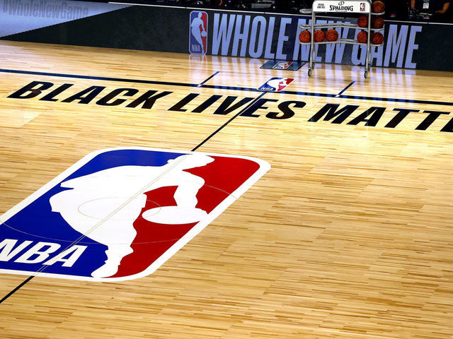 LAKE BUENA VISTA, FLORIDA - AUGUST 01: An overview of the basketball court shows the NBA logo and Black Lives Matter before the start of a game between the Denver Nuggets and the Miami Heat at HP Field House at ESPN Wide World Of Sports Complex on August 01, 2020 in Lake Buena Vista, Florida.