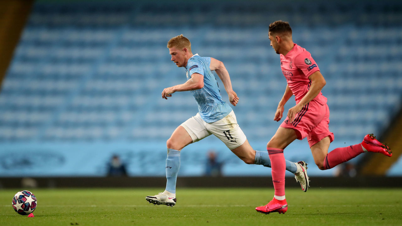 Manchester City's Kevin De Bruyne (left) gets past Real Madrid's Federico Valverde during the UEFA Champions League, round of 16, second leg match at the Etihad Stadium, Manchester. Friday August 7, 2020. See PA story SOCCER Man City. Photo credit should read: Nick Potts/NMC Pool/PA Wire. RESTRICTIONS: Editorial Use Only, No Commercial Use