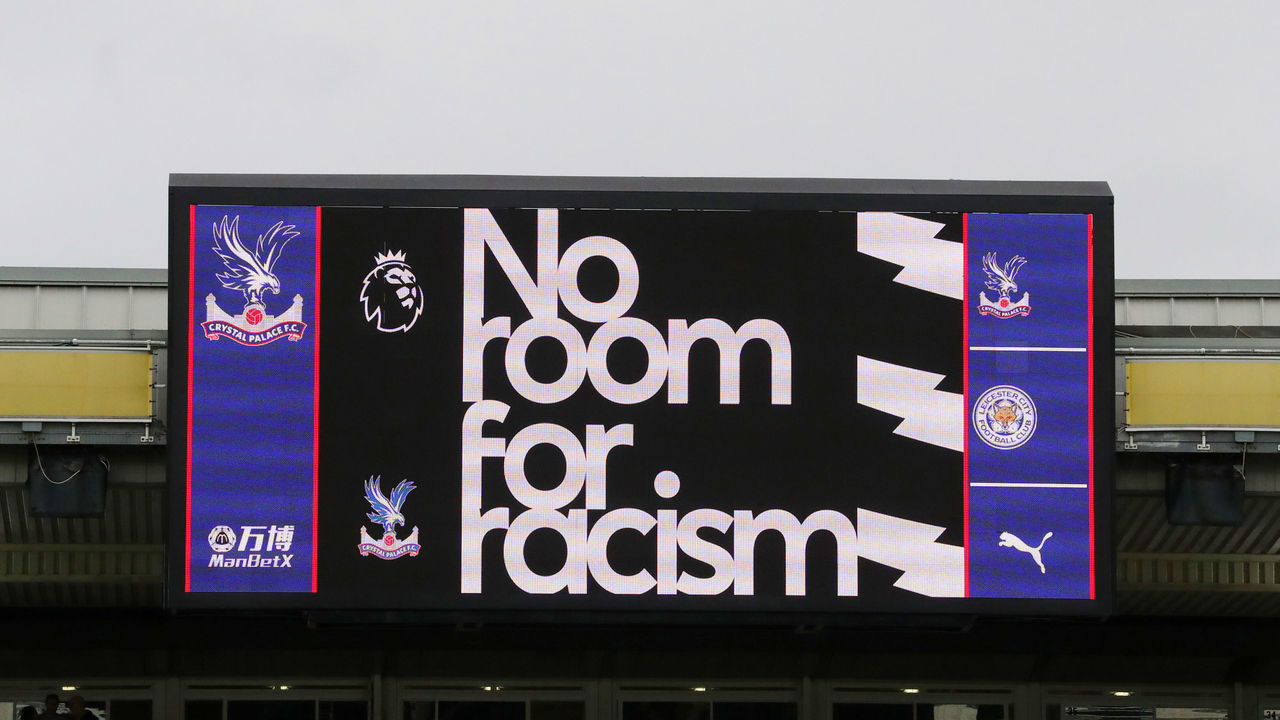 LONDON, ENGLAND - NOVEMBER 03: No room for racism is displayed on the screen during the Premier League match between Crystal Palace and Leicester City at Selhurst Park on November 03, 2019 in London, United Kingdom.