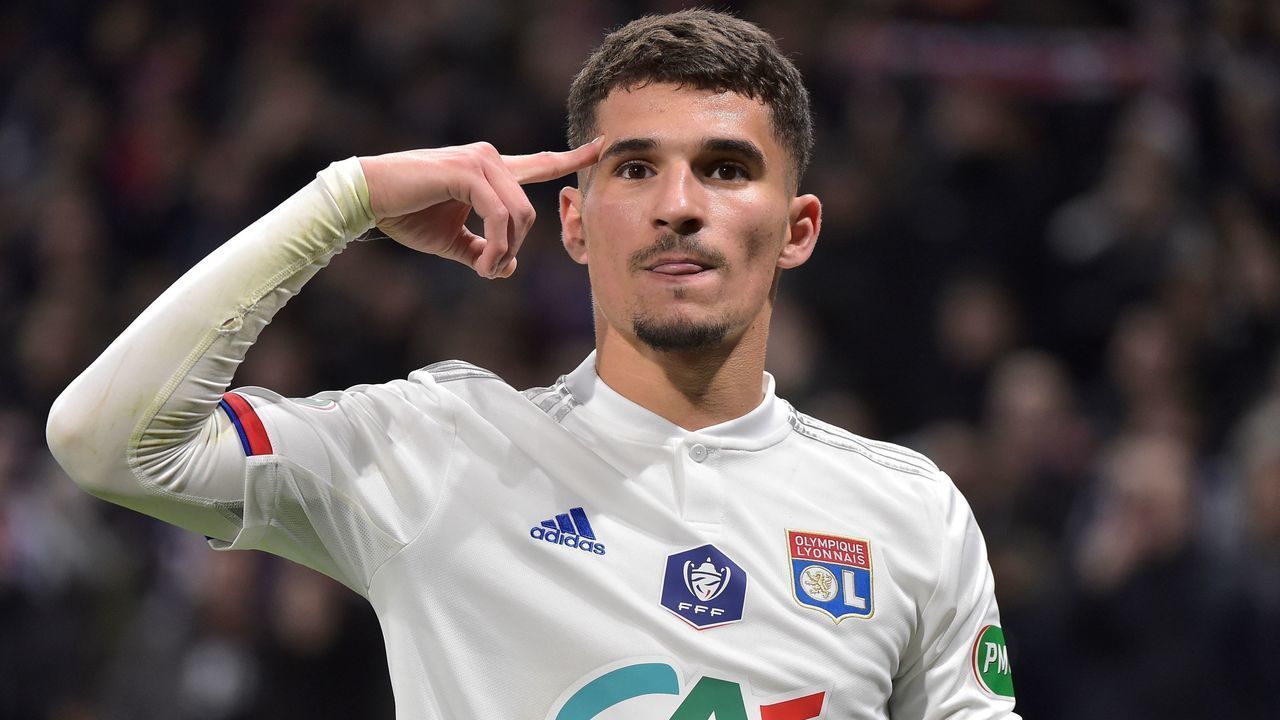 Lyon's French midfielder Houssem Aouar celebrates after scoring the opener during the French Cup quarter-final football match between Olympique Lyonnais and Olympique de Marseille at the Groupama stadium in Decines-Charpieu near Lyon, central eastern France on February 12, 2020.